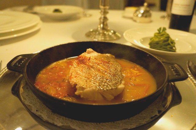 Snapper provencale served with espelette peppers and basil pesto capellini at Le Basilic (Mediterranean) restaurant in Cancun, Mexico