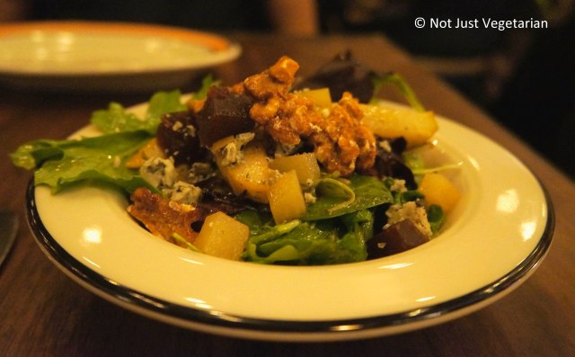 Pear salad with valdeon cheese, quince paste, and candied walnuts at Barraca NYC