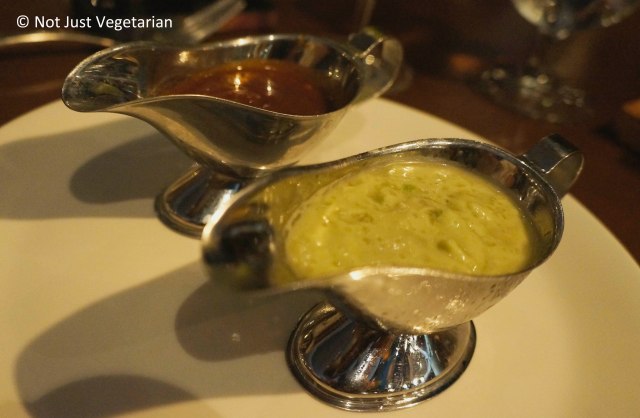 Sauces for tacos (Chipotle and Avocado) at Fred's House Seafood Market & Grill in Cancun, Mexico