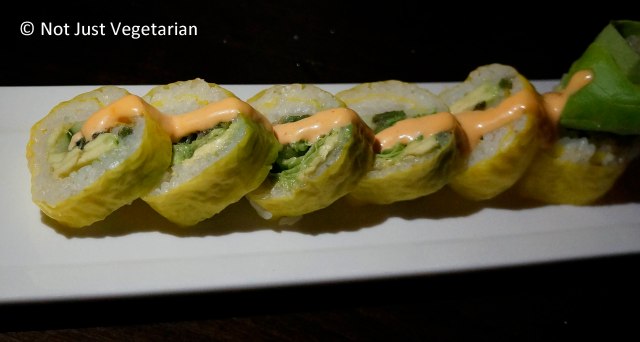 The Vegetariano roll - with asparagus scallion tempura, avocado,  sambhal aioli, and soy paper - at Zengo NYC