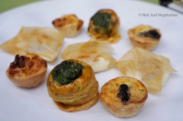 Bouchee Escargot (front row middle) and Quiche Boudin (front row right) at Jeanne and Gaston NYC