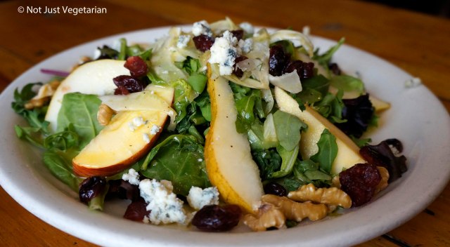 Autumn salad with endives, pears, walnuts, and cranberries at 'sNice cafe in the West Village in NYC