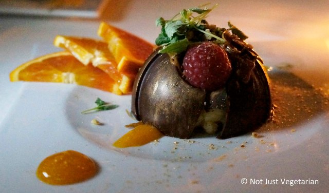 Ekmek - kataifi and cream with pistachios, wrapped in a Valhroha chocolate dome - at Thalassa NYC