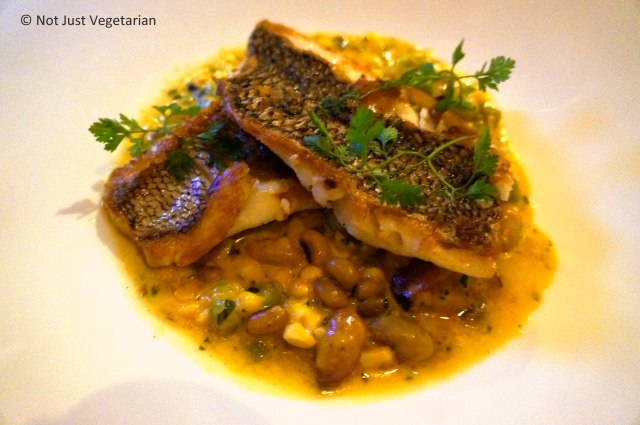 Black bass on summer succotash, bacon and clams at Greenwich Project NYC