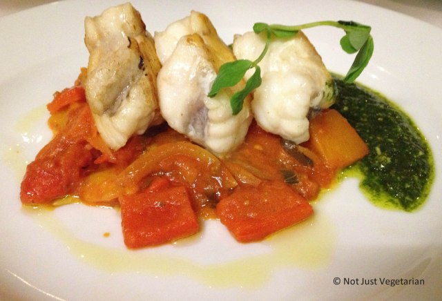 Monkfish with peperonata and basil oil at Stuzzico in London