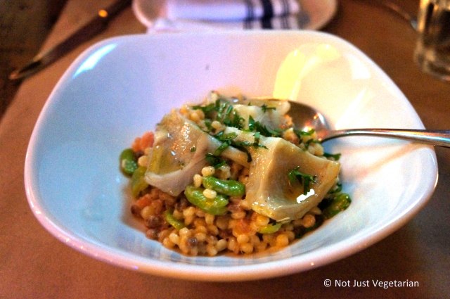 Braised artichokes with fregula sarda, fava beans, and lemon at Willow Road NYC