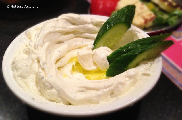 Labneh with cucumbers and olive oil served at Ranoush Juice in High Street Kensington in London