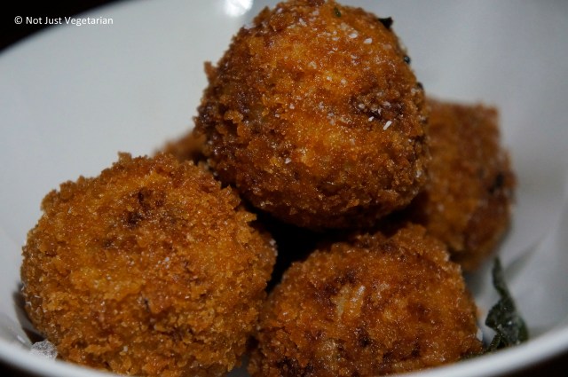 Arancini (deep fried rice balls) with ham, fontina cheese and sage at L'Apicio in NYC