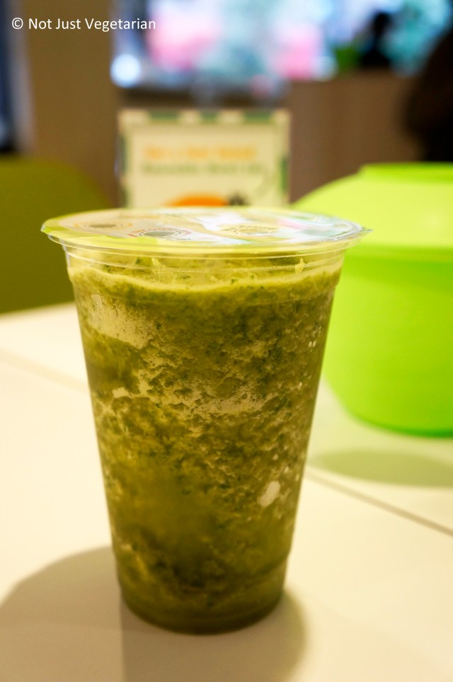 Detoxer Juice (Kale, apple, pineapple, and lemon) with a hemp protein boost at Just Salad in NYC
