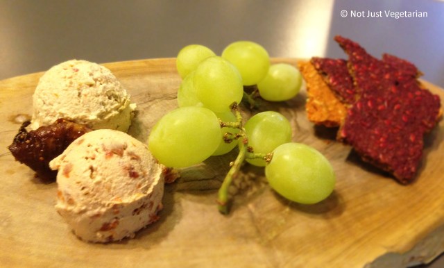 Fermented cashew cheese with grapes and flax seed crackers at SAF in London