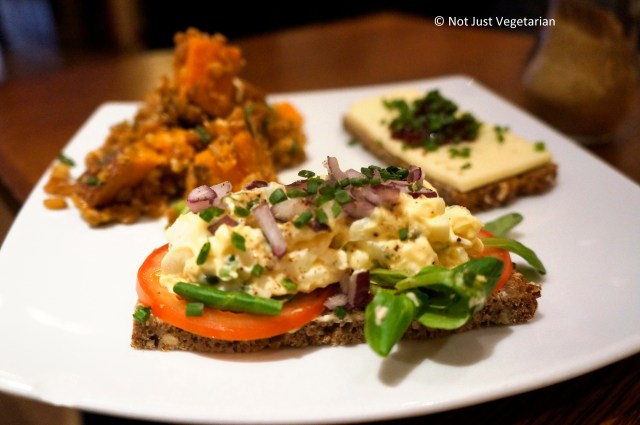 Egg salad with watercress, red onions and chives in bread at Scandinavian Kitchen in London 