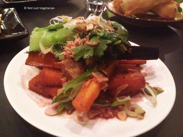 Grilled polenta with chilli pickled heritage carrots, coriander and bok choy at Kopapa in London