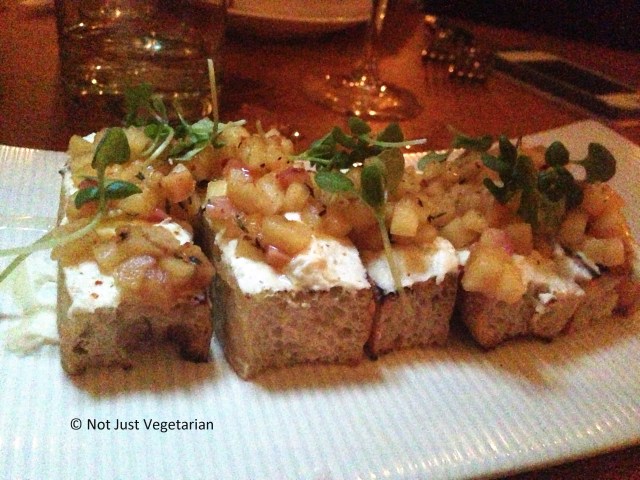 Whipped ricotta with grilled honey crisp apple, thyme cider reduction and lavender honey at Beauty & Essex in NYC