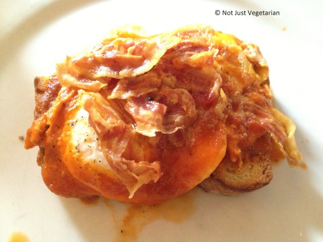 "ouva alla Napoletana" - poached eggs in tomato sauce with bacon served on toasted bread - at Grano Trattoria NYC
