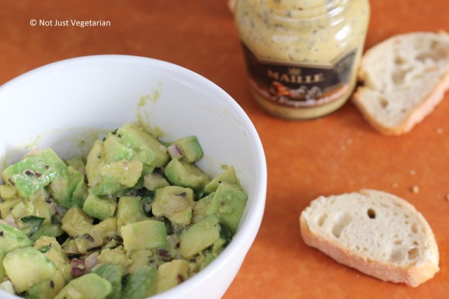 Avocado tartare made with Maille mustard with  hazelnut and black chanterelle mushrooms