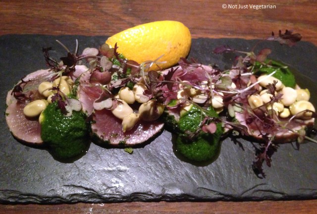 Tuna carpaccio with broad beans and salsa verde at Salt Yard in London