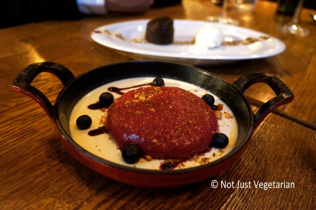 Honey and Hazelnut pannacotta, blue berries,blackberry foam and hazelnut praline at 28-50 in Marylebone, London